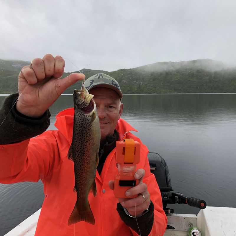 man with autosett small and a fish.jpeg